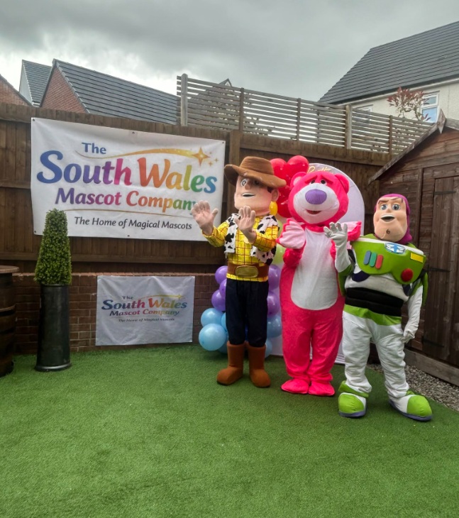 Woody, Lotso and Buzz lookalike mascots at a party
